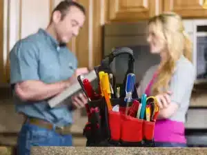 HVAC Tech advising Customer